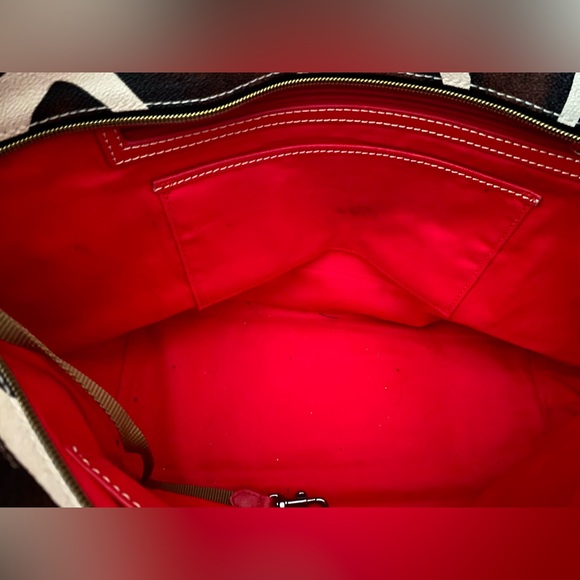 Dooney & Bourke giraffe print tote with red strap. - Picture 9 of 15